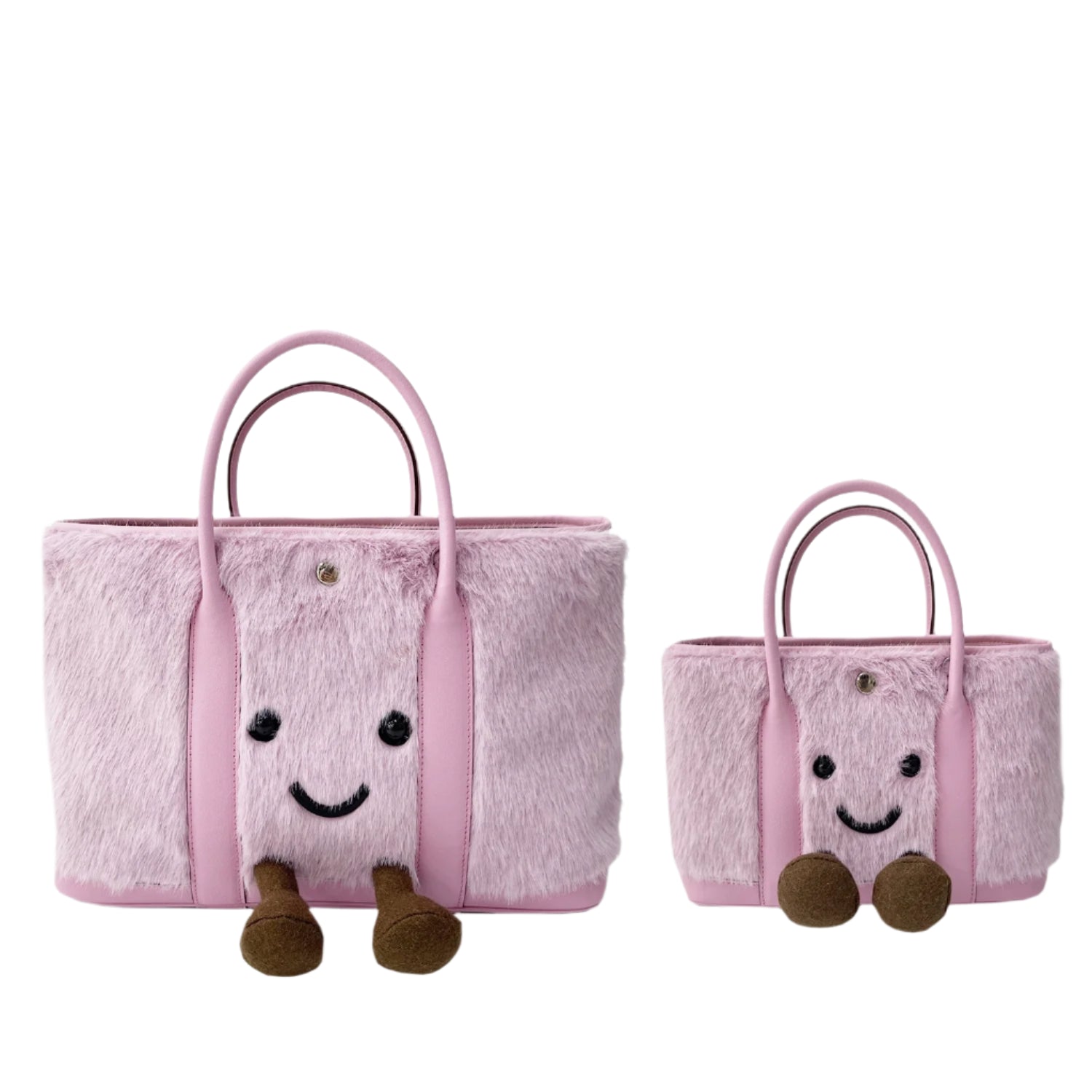 Two pink plush bags with smiling faces on a white background, featuring the brand Jellykin