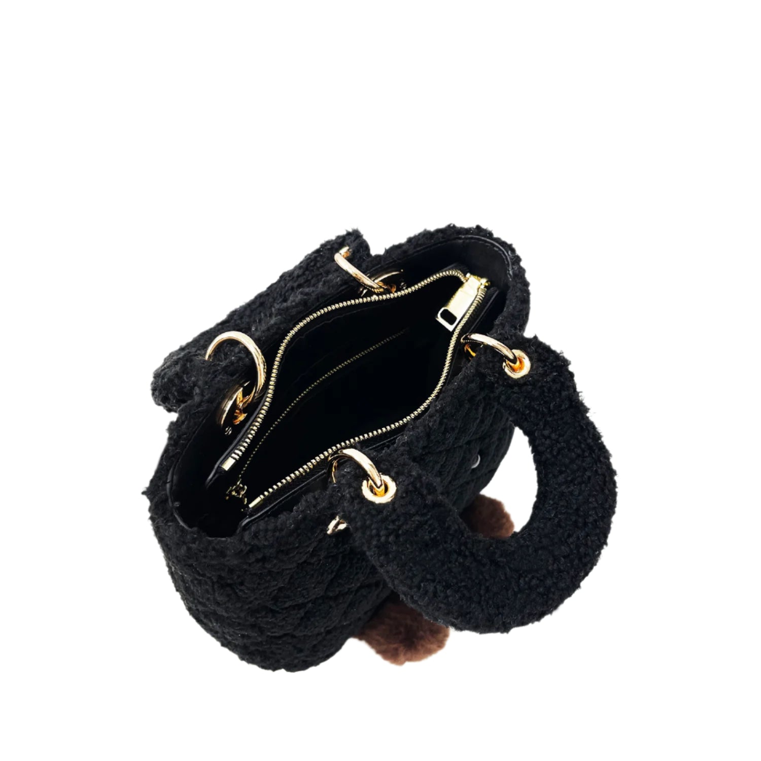 Black textured handbag with gold zippers on a light gray background, featuring the brand jellykin